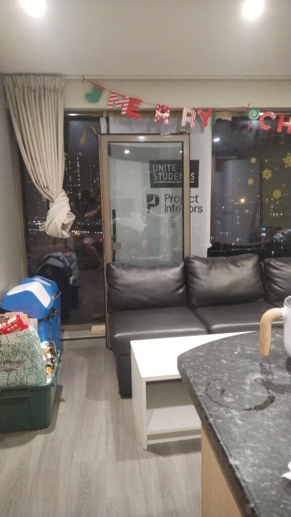 A broken window in a shared flat kitchen